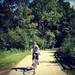 A rider take a cruise on her new bike at the Argo Nature Area (rpkel)
